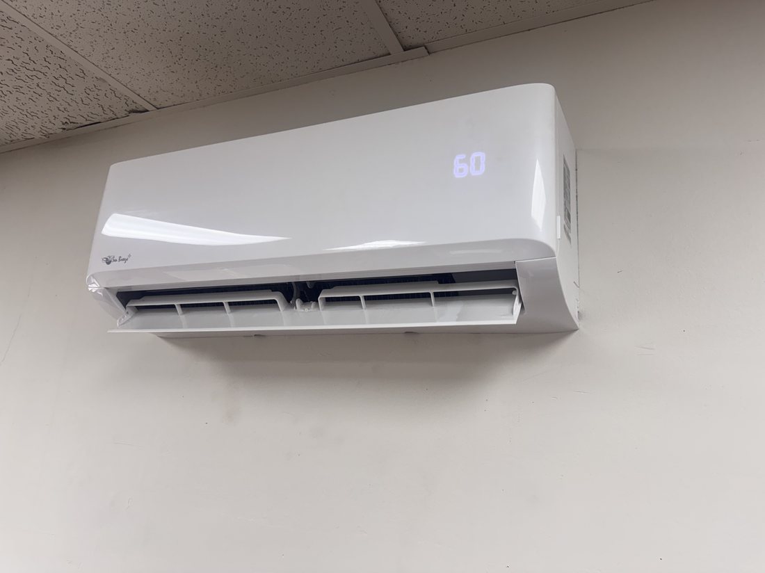 Wall-mounted ductless mini-split head, installed and running
